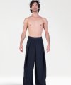 Pantaloni Larghi con Pieghe Laterali